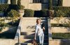 ellen pompeo plays with her toy poodles gigi and valentin, beside the swimming pool at her home in the hollywood hills