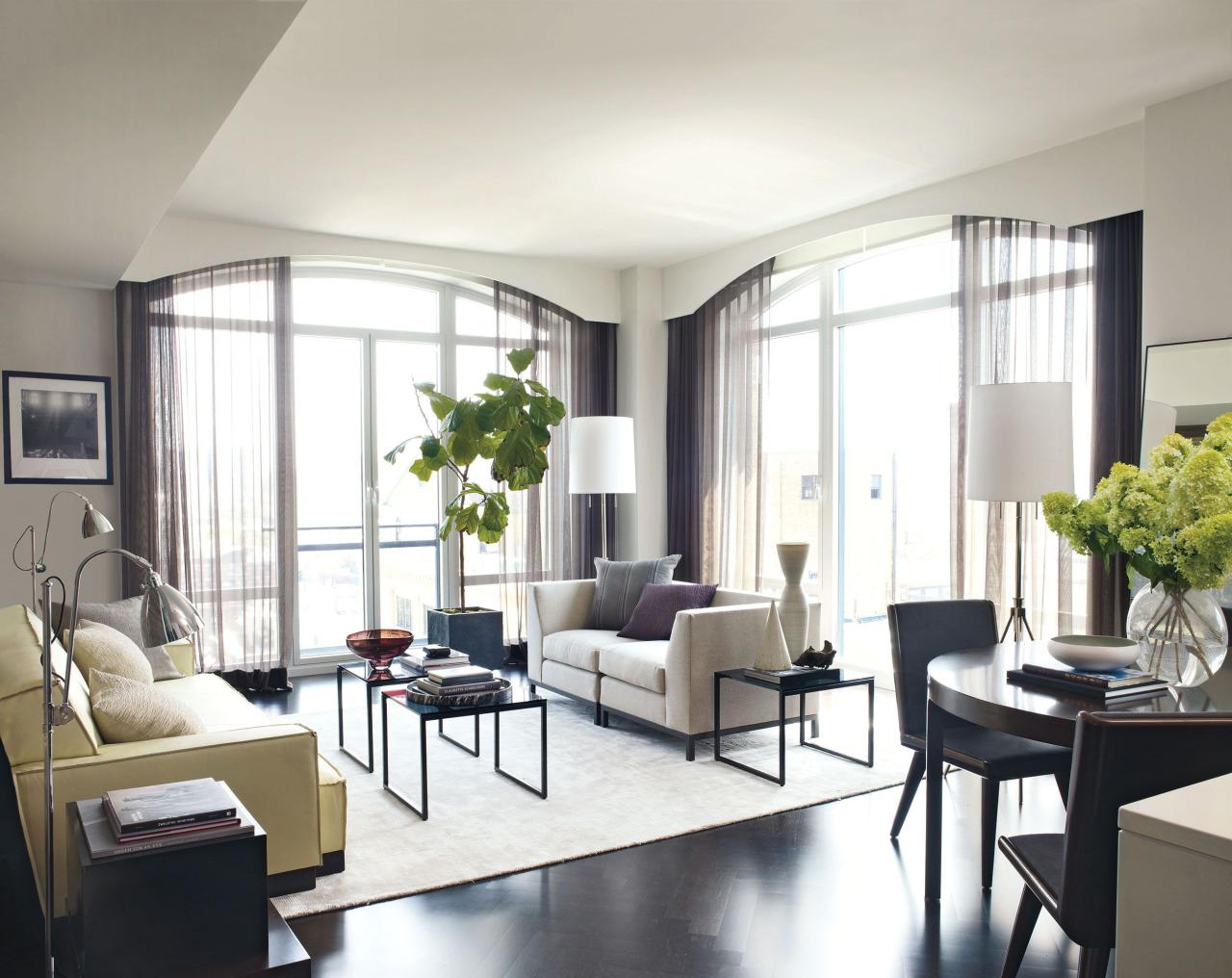 in the living area of her manhattan apartment which was designed by mark zeff,the sofas tables and rug are by calvin klein home