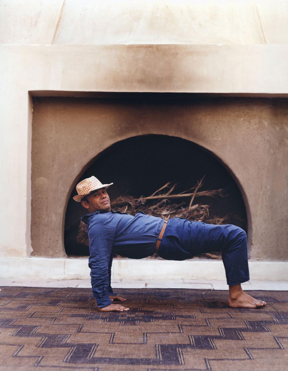 shoe designer christian louboutin practices yoga at his retreat near aswân, egypt