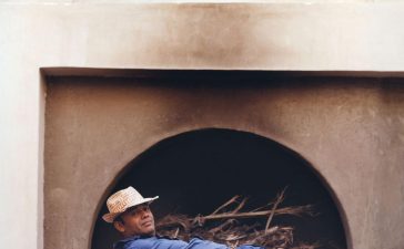 shoe designer christian louboutin practices yoga at his retreat near aswân, egypt