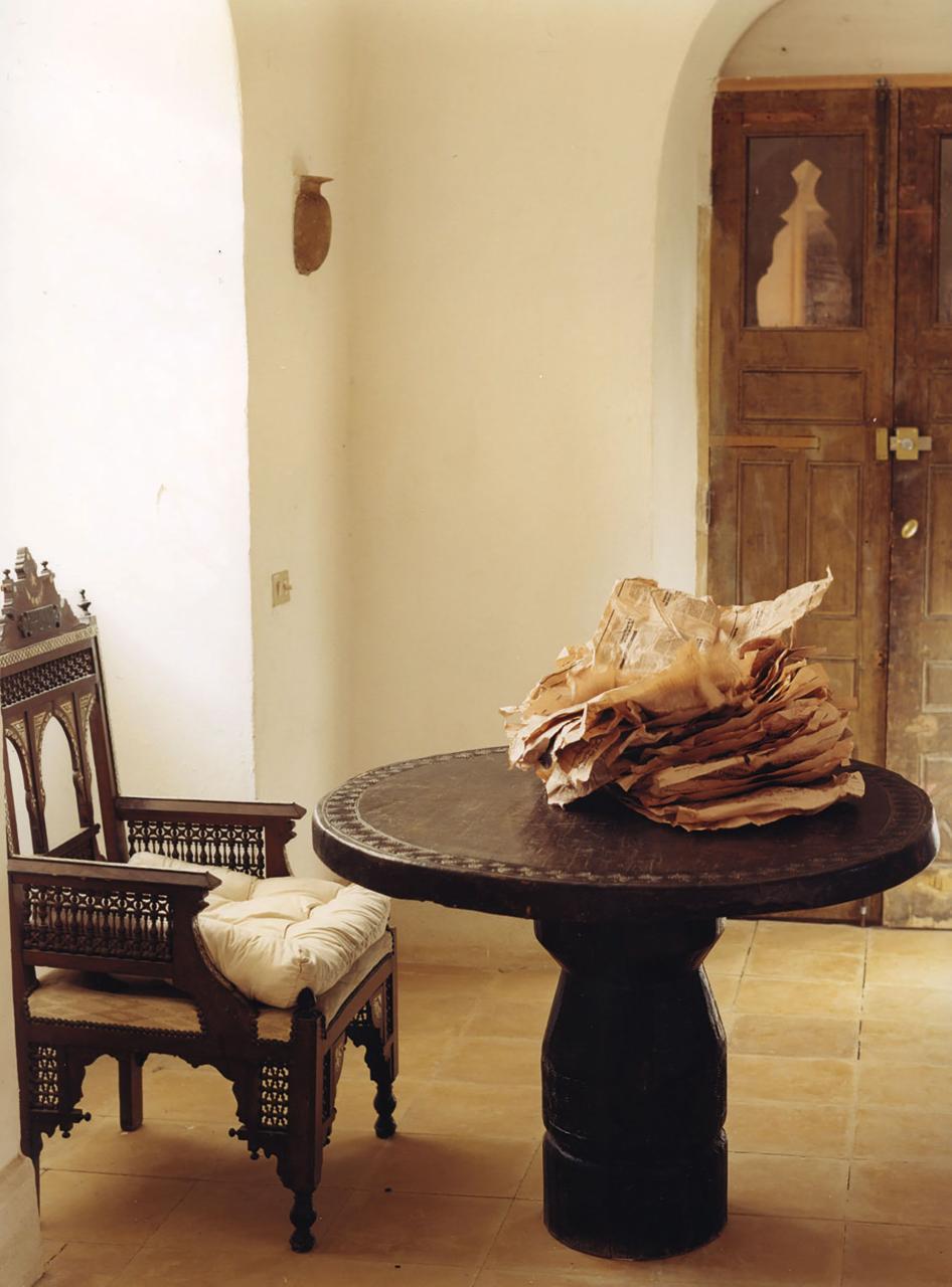 an antique chair and table