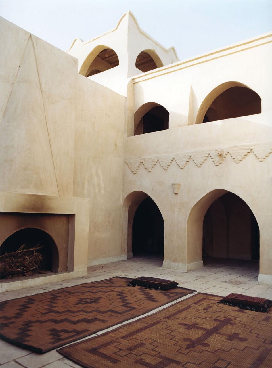 the fireplace in the open air courtyard