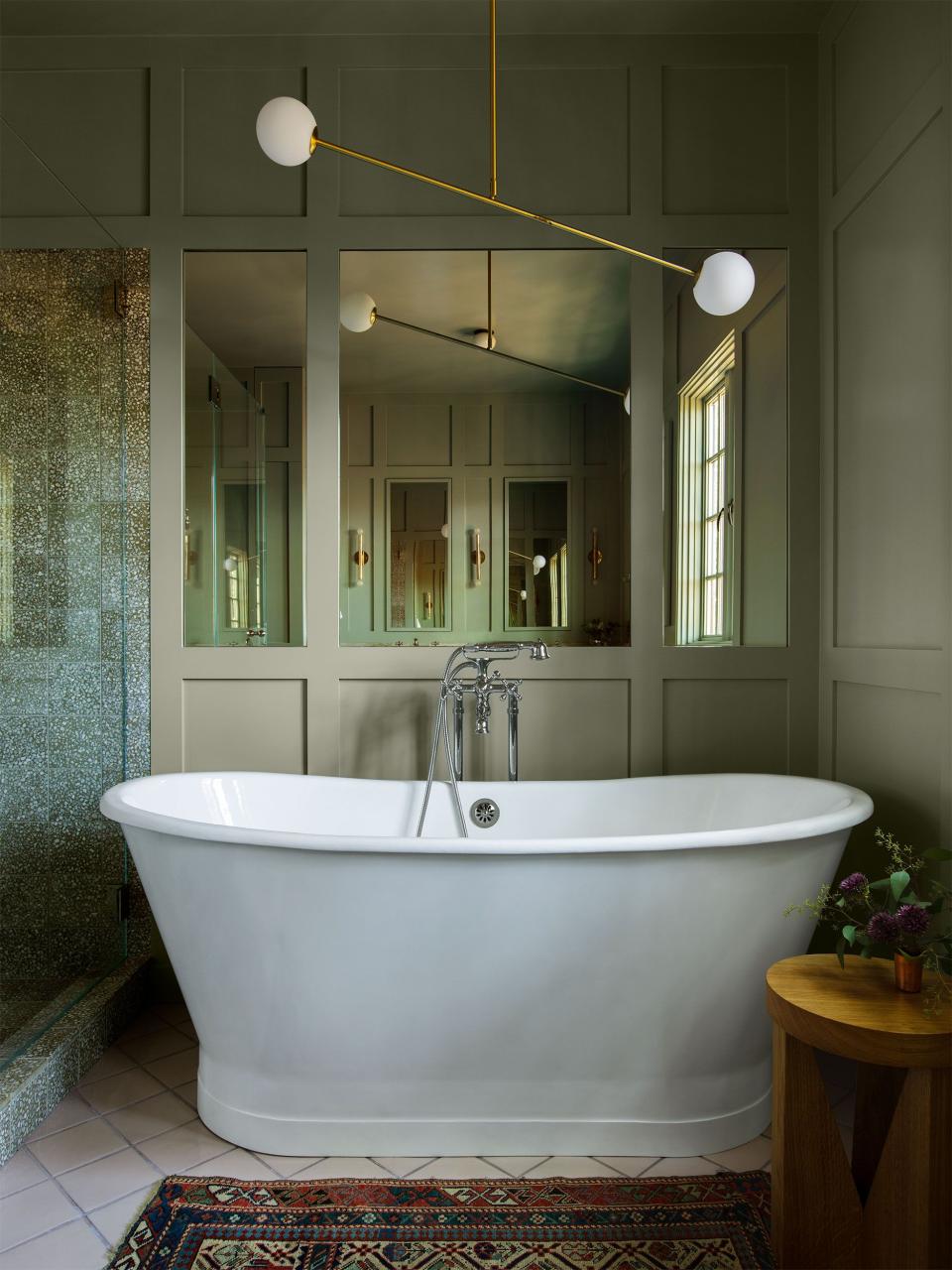 a bathroom with a large mirror